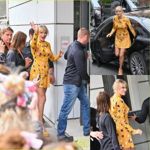 Taylor Swift greets her fans outside the radio studio in Paris