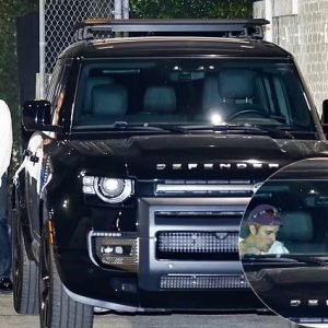 Hailey Bieber shows off her legs in a TINY black leather skirt alongside husband Justin as they dash off in their SUV for a date night