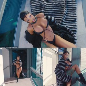 Cardi B nearly SPILLS OUT of bedazzled bra and writhes around in a STRING bodysuit in new music video directed by husband Offset... amid couple's marital woes