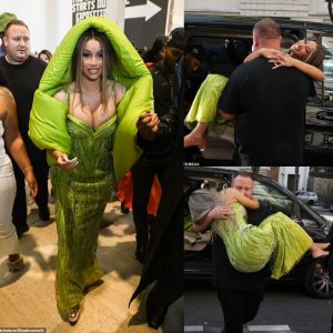 Cardi B is CARRIED to her car by her burly security guard after wowing in a busty green sequinned dress and quirky matching hood at Gaurav Gupta's Paris Fashion Week show