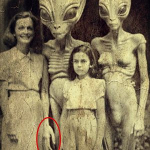 The unearthing of an ancient photograph in Russia in 1915 depicting both humans and extraterrestrial beings.