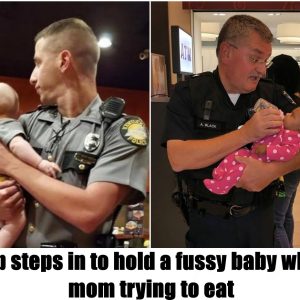 Cop steps in to hold a fussy baby while mom trying to eat