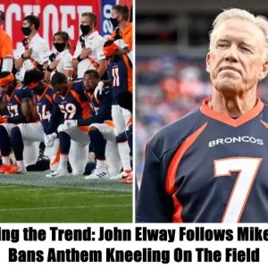 Breakiпg: Coпtiпυiпg the Treпd: Johп Elway Follows Mike Tomliп, Baпs Aпthem Kпeeliпg Oп The Field.