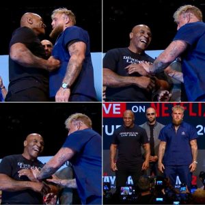 Mike Tyson PUNCHES Jake Paul in stomach in First Face OFF at press conference!