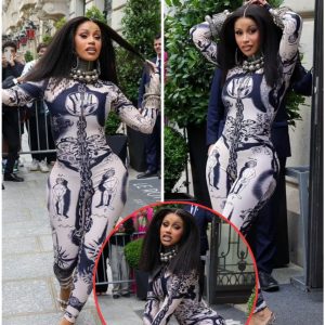 Voulez-vous cou-SHAKE avec moi? Cardi B flaunts her twerking abilities for muddled spectators in Paris prior to going to the Jean Paul Gaultier show in a skintight catsuit