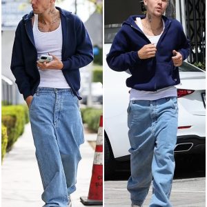 Justin Bieber looks cool in baggy jeans and a navy sweatshirt as he steps out in Los Angeles S-News